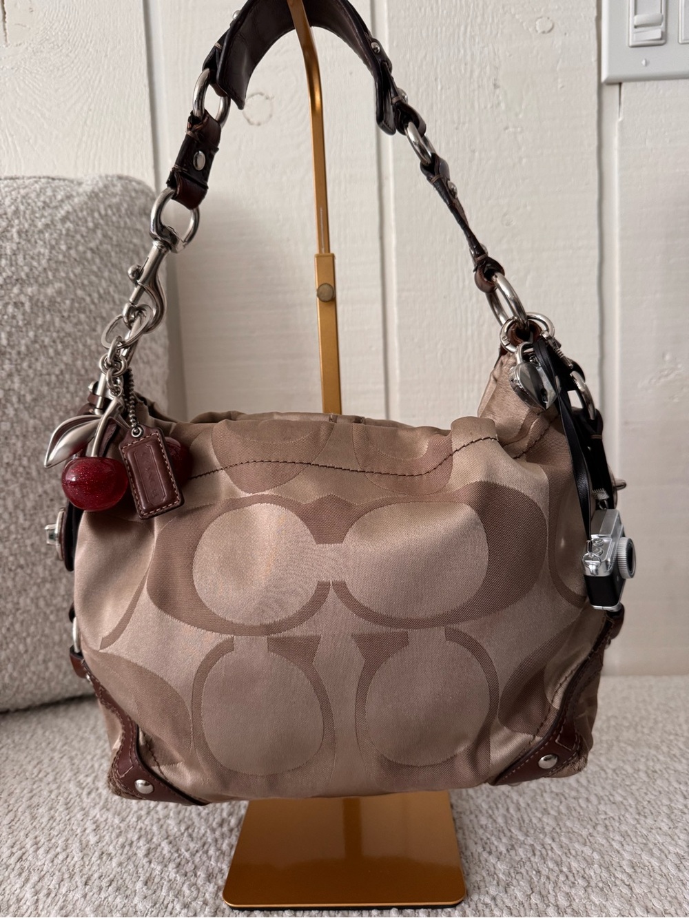 vintage Coach Carly handbag is a tan signature canvas
